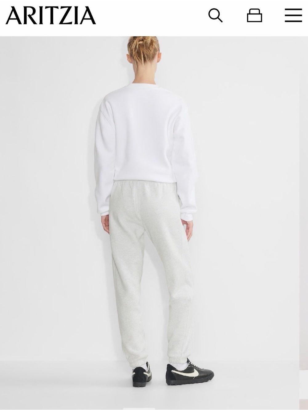 Aritzia TNA Cozy Fleece boyfriend sweatpants.